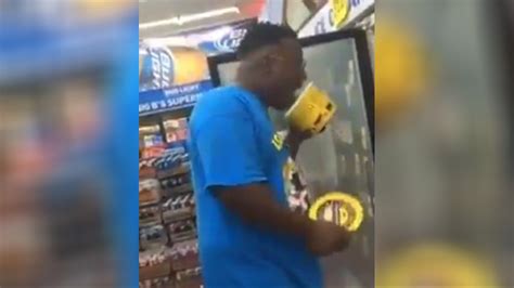 teenager licking|Another person was caught on camera licking ice cream in a store .